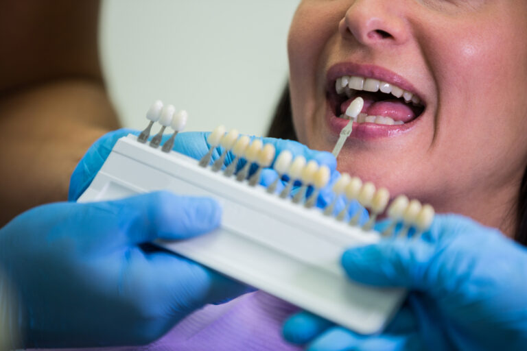 Dentist examining female